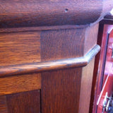 Oak Corner Cupboard: Carved Green Man Detail